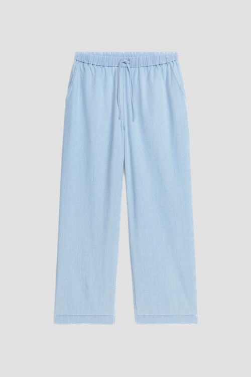 Byxor i ljus denim med dragsko